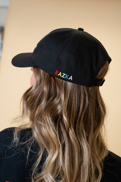 CASQUETTE « SOURCE DE PLAISIRS » NOIRE