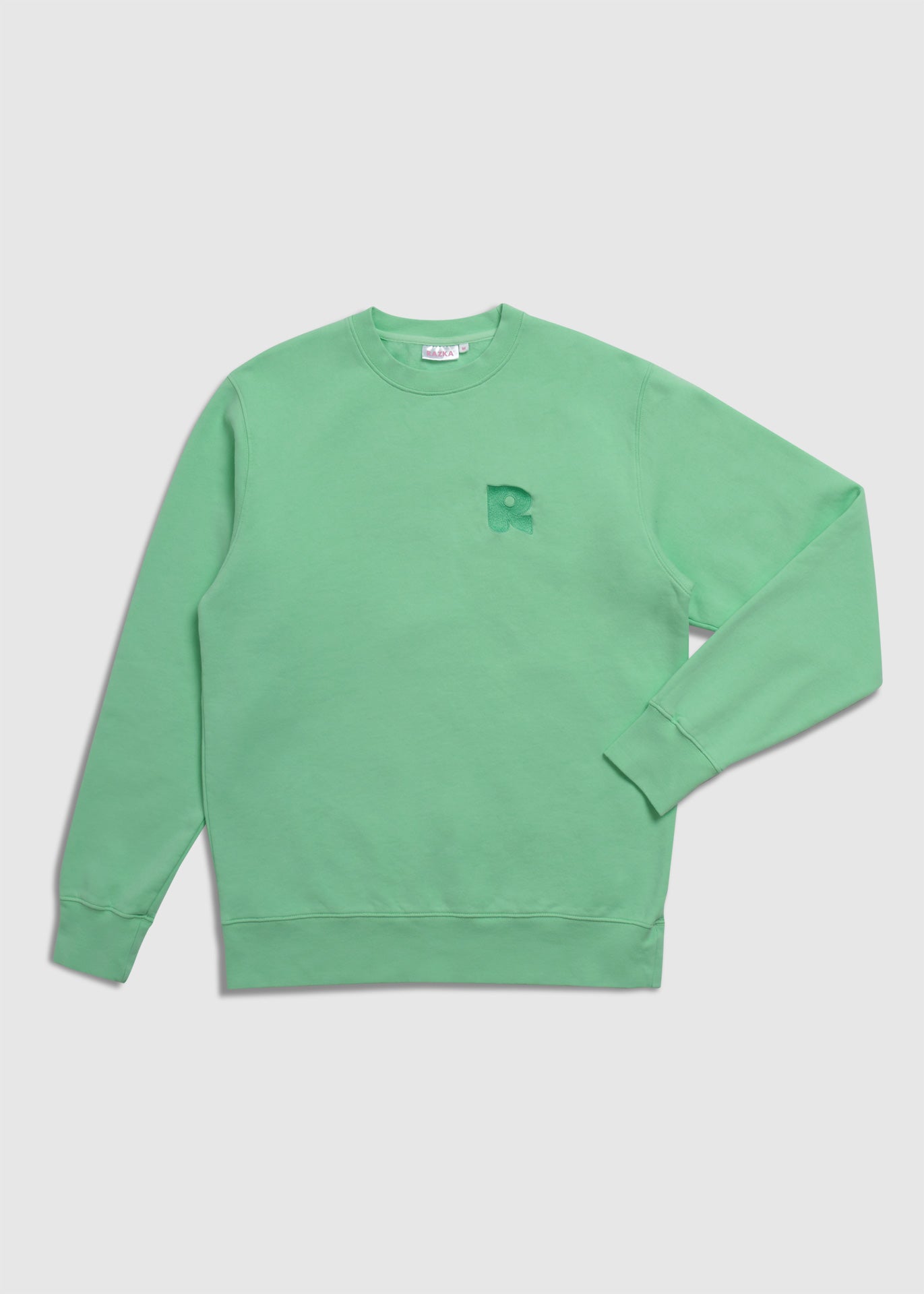 Le pull Vert